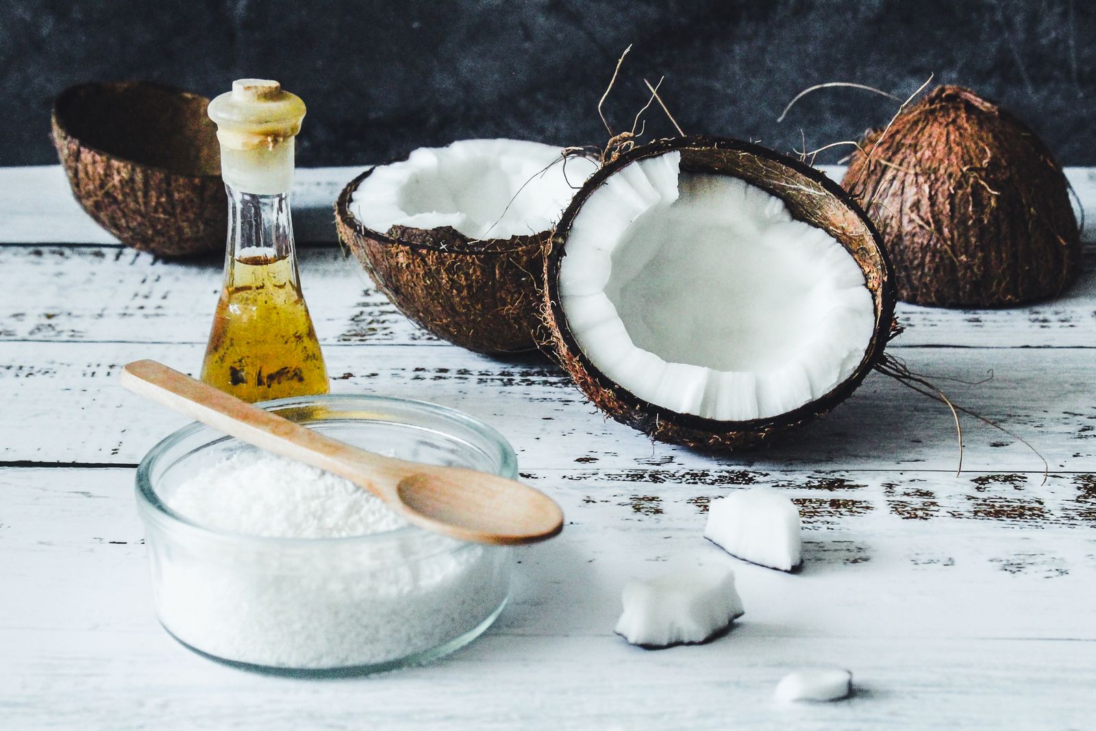 Micronized collagen peptide powder in a glass bowl with a wooden spoon