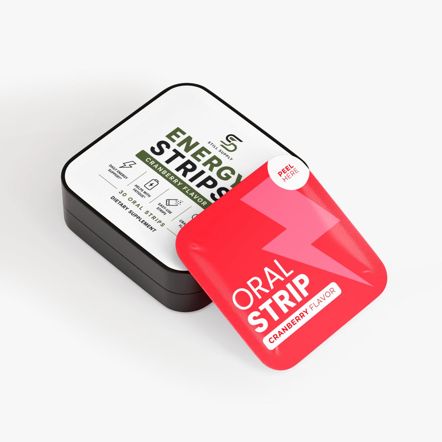 Still Supply Energy Strips tin with a cranberry oral strip pouch on the lid